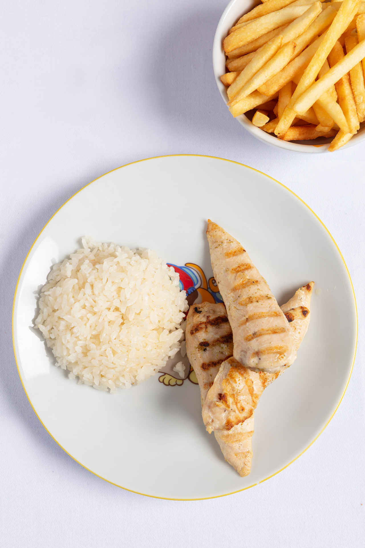 Grilled chicken fillet, rice & french fries